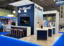 ProMinent stand at Chem UK, 4 walled island with pergola coming off, pennant-lit roof