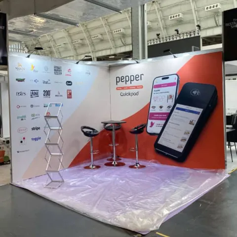 Pepper's stand at hospitality Expo - 2 walls, a literature rack and poseur table, 2 stalls